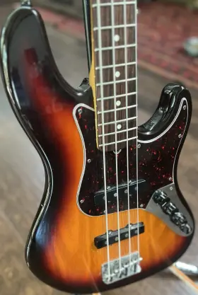 0143512300 Fender 1997 American Deluxe Jazz Bass Electric Guitar