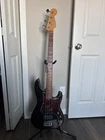 2001 Fender American Deluxe Precision Bass Black Finish W/ohsc Used. Price: $1100.00.