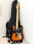 Squier Telecaster Sunburst With Fender Case And Strap Used. Price: $437.64.