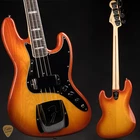 Fender Custom Shop 1975 Jazz Bass Nos - Faded Cherry Sunburst #R107478 New. Price: $5325.00.
