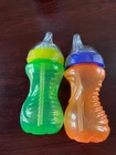 Nuby No-spill Sippy Cup With Flex Straw Set Of 2 Box Sealed Tops Orange Green New. Price: $10.00.