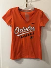 Nfl Slim Fit Baltimore Orioles Women Size Small T-shirt Used. Price: $24.95.