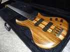 Vintage 1993 Pedulla T4 Thunderbass (buzz) Fretless Guitar /zebrawood Top. Used. Price: $4250.00.