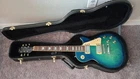 Epiphone Les Paul Standard Plus Flame Top 2006 Japan Fujigen Blueburst Used. Price: $650.00.