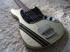 Rare 2012 Squier Mikey Way Signature Mustang Bass Short Scale Silver Sparkle. Used. Price: $999.99.