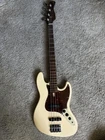 Sire Marcus Miller V5 4-STRING Bass Guitar, Vintage White Used. Price: $525.00.