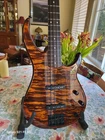 Peavey Millennium 4-STRING Electric Bass Guitar Tiger Maple Top W/ Case Used. Price: $475.00.