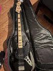 Squier Jazz Bass 4-STRING Electric Guitar Black W/gig Bag Used. Price: $325.00.
