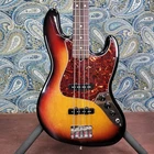 Used Fender American Standard Jazz Bass Sunburst 2008 W/case. Price: $1049.99.