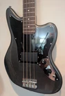 Squier Affinity Series Jaguar Bass 4 String Guitar (charcoal Frost Metallic) Open. Price: $275.00.