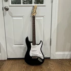 Squier Stratocaster Series Electric Guitar Black Solid Body 6-STRING Right Used. Price: $120.00.