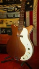 Vintage 1961 Danelectro Model 3412 Shorthorn Bass 3/4 Scale Gold With Gig Bag Used. Price: $1499.00.