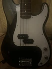 Squier Precision Bass Electric 4 String Solid Body Black Guitar W/ Amplifier Used. Price: $249.00.