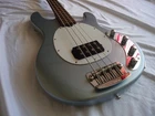 Sterling By Music Man Stingray RAY34 Firemist Silver Bass Guitar. Used. Price: $749.99.