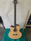 Electric Guitar With Soft Case, Dean, 4 String, Looks Acoustic Used. Price: $200.00.