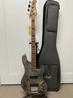 Cort Gb-modern 4 Bass Guitar Open Pore Charcoal Gray. Price: $699.99.