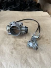 Oem Suzuki Throttle Body Pn# 13300-96J01 (B-24) Used. Price: $124.99.