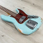 Fender Custom Shop 1961 Jazz Bass Heavy Relic, Faded Aged Daphne Blue New. Price: $5350.00.