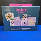 Brand New Fujifilm Instax Mini 12 Lilac Purple Camera Bundle. Price: $89.99.