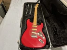Squier Stratocaster Red 6-STRING Electric Guitar Maple Neck W/ Hard Case Strap Used. Price: $499.00.