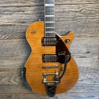 Gretsch G6134TFM-NH Nigel Hendroff Penguin Amber Flame New. Price: $3699.99.