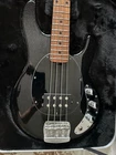 Ernie Ball Music Man Short Scale Stingray Black Sparkle (with Case) Used. Price: $2299.00.