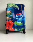 Bioworld Disney Stitch Luau 28 Hardside Wheeled Spinner Suitcase Luggage New. Price: $150.00.