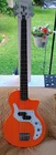 Orange O-bass Electric Guitar W/gig Bag Used. Price: $350.00.