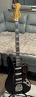 Squier Classic Vibe Bass Electric Guitar Black W Tremolo Arm Used. Price: $409.99.