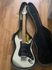 Vintage Martin Stinger Ssx Electric Guitar - White Mik Used. Price: $339.99.