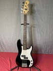 Squier Mini Electric Bass Guitar Black 4-STRING Solid Body Right-handed Used. Price: $145.00.