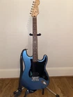 Squier Bullet Electric Guitar With Hum Bucker Pickup And Strap Used. Price: $170.00.