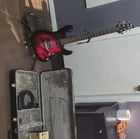 Schecter Red Electric Guitar 6-STRING W/ Case, Amp, Cable, Strap, Pick Used. Price: $1000.00.
