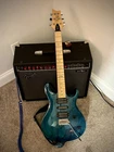 Prs Swamp Ash Special Electric Guitar - Iri Blue Used. Price: $550.00.