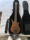 Warwick Pro Series Thumb Bo 6-STRING Electric Bass, Brown, Gig Bag & Strap Used. Price: $3000.00.