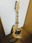 Electric Bass Guitar Squier By Fender Jazz Natural Indonesia Sn 060846689 Used. Price: $695.00.