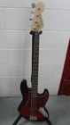 Squier By Fender Jazz Bass Standard Series Used. Price: $329.99.