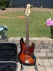 2003 Squier Standard Jazz Bass With Case Used. Price: $349.00.