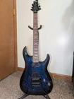 Schecter Omen ELITE-6 Fr Electric Guitar See-thru Blue Burst Open. Price: $499.00.