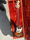 1993 Fender American Longhorn Jazz Bass Black W Hard Case Open. Price: $1500.00.