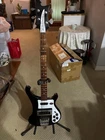 Rickenbacker 4003S Bass. Jetglo Black With Flight Case Used. Price: $2000.00.