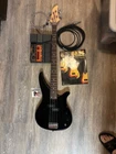 Yamaha Bass Guitar Black RBX-264 Slightly Used W/case & Extras. Price: $219.75.