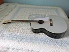 Guitar By TARIO-42" Acoustic Jumbo Spruce Top, Mahogany Sides Used. Price: $120.00.