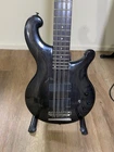 Dean Rhapsody 12-STRING Electric Bass Guitar Trans Black Used. Price: $675.00.