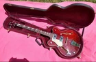 Eastwood Classic 4 Bass Guitar (left Handed) Walnut Red W/ Hard Case Used. Price: $475.00.
