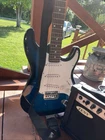 Zeny Blue Solid Electric Guitar 6 String With Amplifier And Strap Used. Price: $150.00.