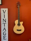 Oscar Schmidt OB100N-A New Natural. Price: $449.95.