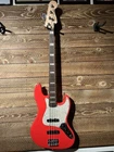 Squier Custom Upgraded Jazz Bass - Race Red W/fender Gig Bag Used. Price: $449.00.