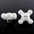 329503 Large Replacement Porcelain Cross Handles New. Price: $84.00.