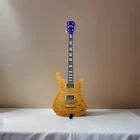 Cort Mgm Quilted Maple Top Natural Solid-body 6-STRING Rh 22-FRET W/strap Used. Price: $400.00.